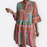 Madalena - Boho-tyylinen kerrosmekko, jossa on virtaava leikkaus